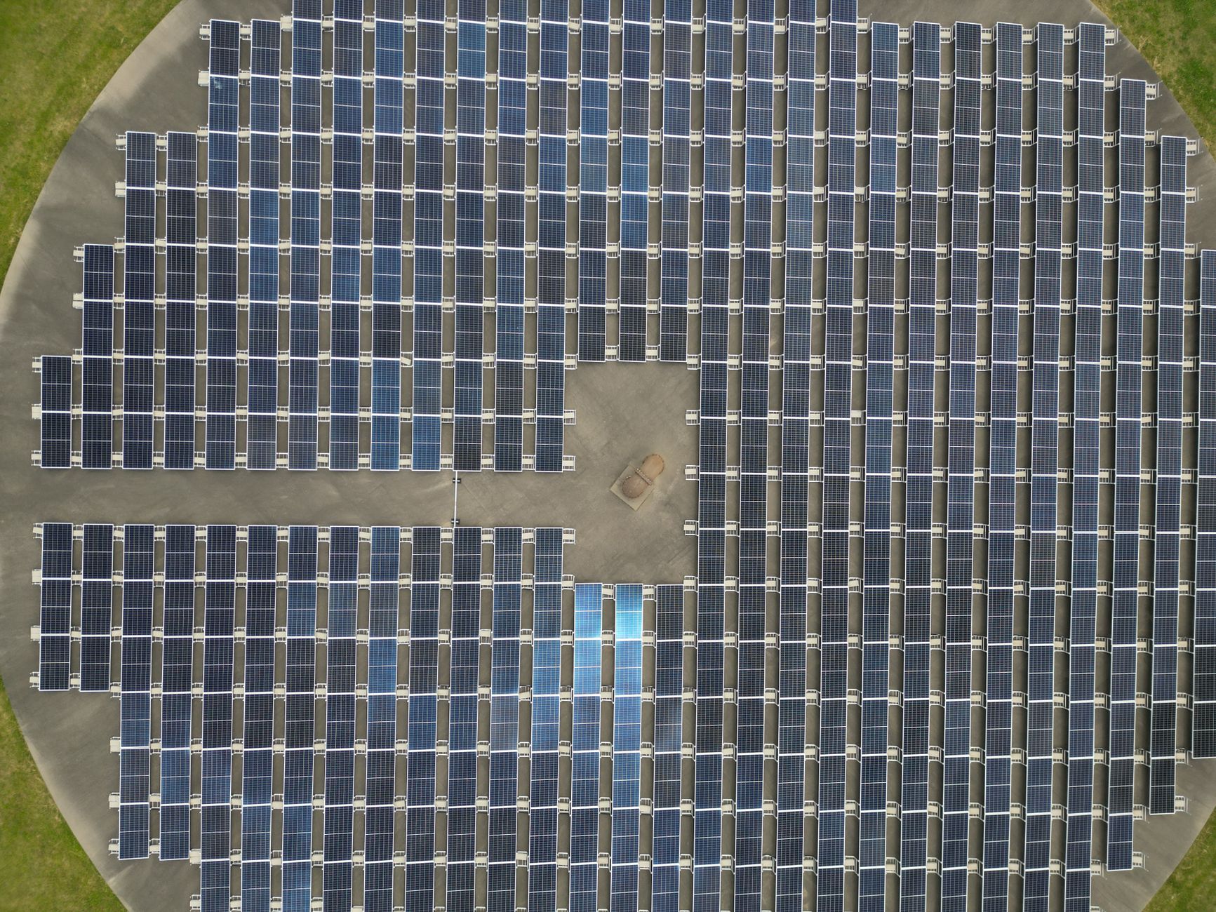 Aerial view of large solar panel array generating renewable energy.